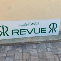 Insegna pubblicitaria orologi Revue