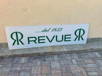 Insegna pubblicitaria orologi Revue