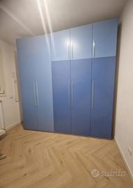 Armadiatura compresa di letto a scomparsa