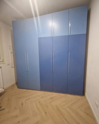 Armadiatura compresa di letto a scomparsa