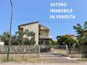 casa-singola-con-due-appartamenti-r56