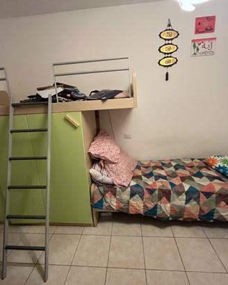 Camera da letto con 3 letti
