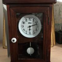 Orologio a pendolo, cassa in legno, marca BINO