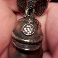 uovo di Faberge'. pendente in argento 