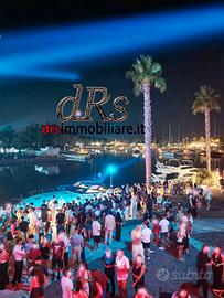 Porto Argonauti. Attico vista mare e porto