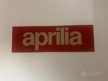 Insegna da muro Aprilia