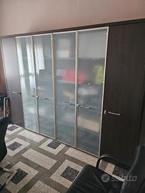 scrivania angolare  metri 2×2, profonda  cm 90. 