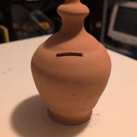 Salvadanaio in terracotta