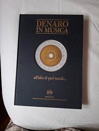 Denaro in musica all'idea di quel metallo-sitrade