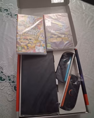 NINTENDO SWITCH  2 CON  2 GIOCHI  NUOVI 