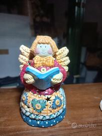 angioletto porta candela in ceramica 