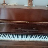 PIANOFORTE FUNZIONANTE a parete in radica di noce