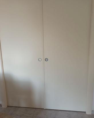porta a due ante scorrevole a scrigno