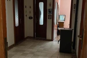 Appartamento + corte + garage