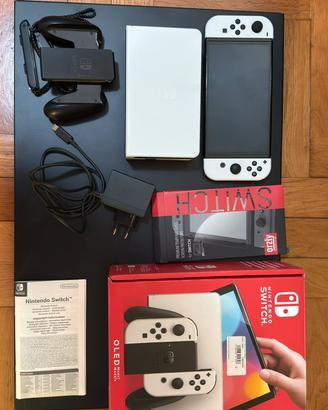 Nintendo switch oled +pokem spada consegna a mano