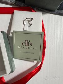 Solitario oro bianco con diamante