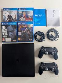 PS4 Slim + 4 giochi (The Last of Us 2, Valhalla)