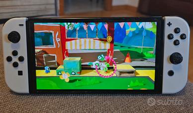 Nintendo Switch Oled+7 giochi top+Sd 64 gb+Joy-Con