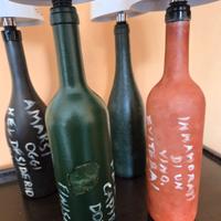 Bottiglie decorate a mano con aforismi