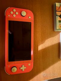 Nintendo switch lite tosa coral + 2 giochi