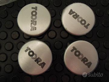 Quattro tappi coprimozzo Toora nuovi