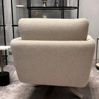 Elegant and comfortable beige armchair