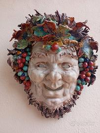 Maschera in terracotta e smalto policromo 