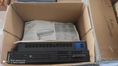 PS2 con volante e pedaliera