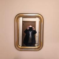 Specchio con cornice dorata