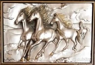 Cavalli al galoppo argento