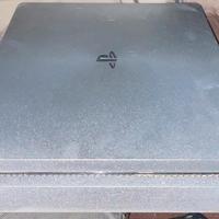 PlayStation 4 con joystick, giochi e cuffie