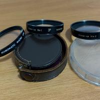 Tre lenti per macchine fotografiche “Nikon”