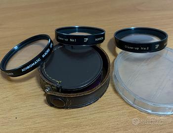 Tre lenti per macchine fotografiche “Nikon”