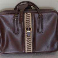 Valigia vintage anni ’60 in pelle con inserti.