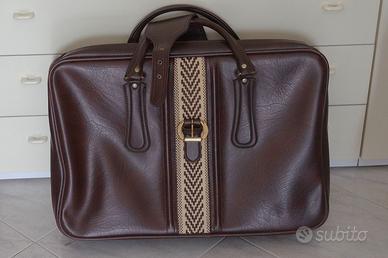 Valigia vintage anni ’60 in pelle con inserti.