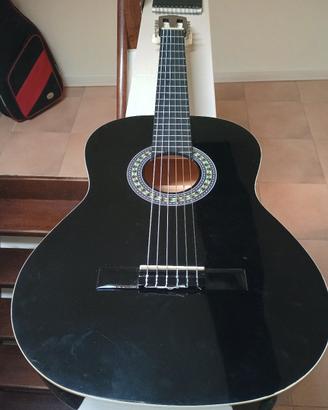 chitarra nuova con portachitarra e capotasto