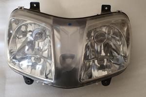 FARO FANALE ANTERIORE YAMAHA XC MBK VERSITY 300 -