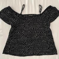 Billabong top nero con pois bianchi