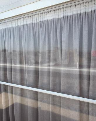Tenda Cristal trasparente con guide per verande
