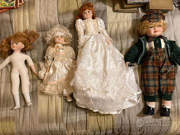 4 bambole in porcellana d'epoca