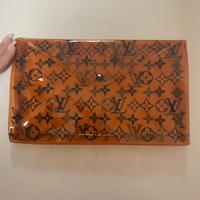 Louis Vuitton pochette in plastica con Monogram