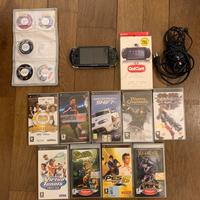 PSP con giochi e accessori (FOTOCAMERA)
