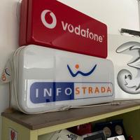 Insegne luminose telefonia anni 2000