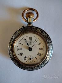 Orologio da tasca F.Bachschmid cesellato a niello.