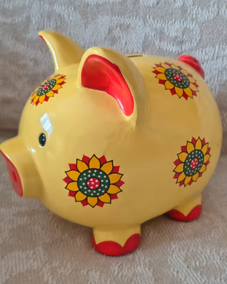 Salvadanaio a forma di maialino in ceramica
