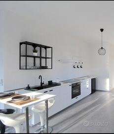 Cucina con elettrodomestici