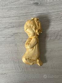 Decorazione dorata da appendere