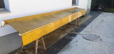 Tenda a bracci avvolgibile.