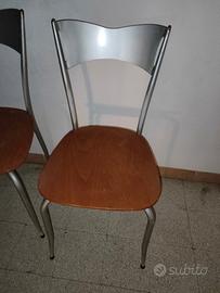 coppia di sedie in legno e acciaio