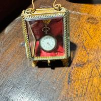 Portaorologio in vetro e metallo dorato